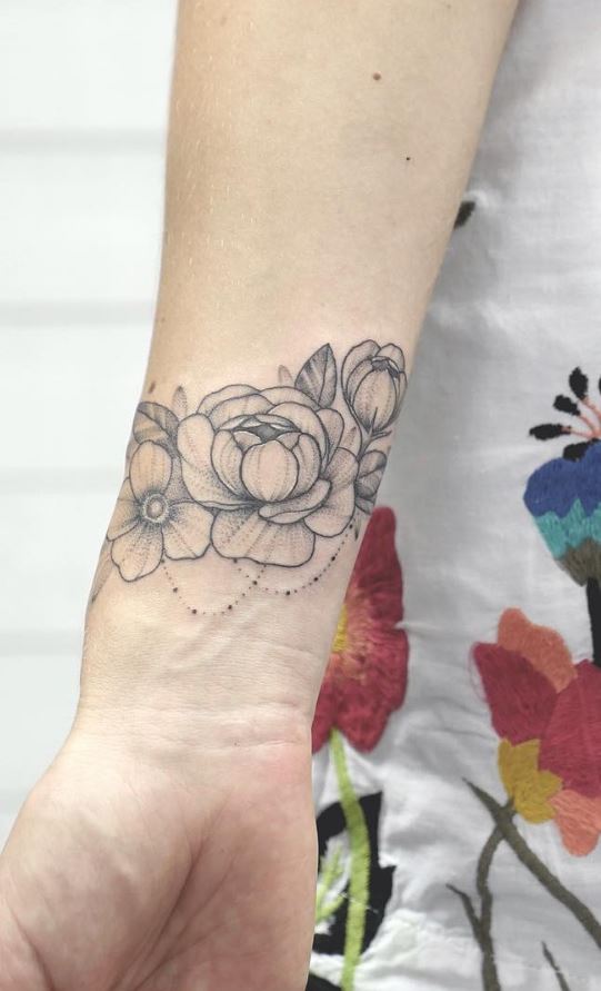 Delicate Flowers Blossom From Inky Black Backgrounds in Esther Garcias  Stylized Botanical Tattoos  Colossal
